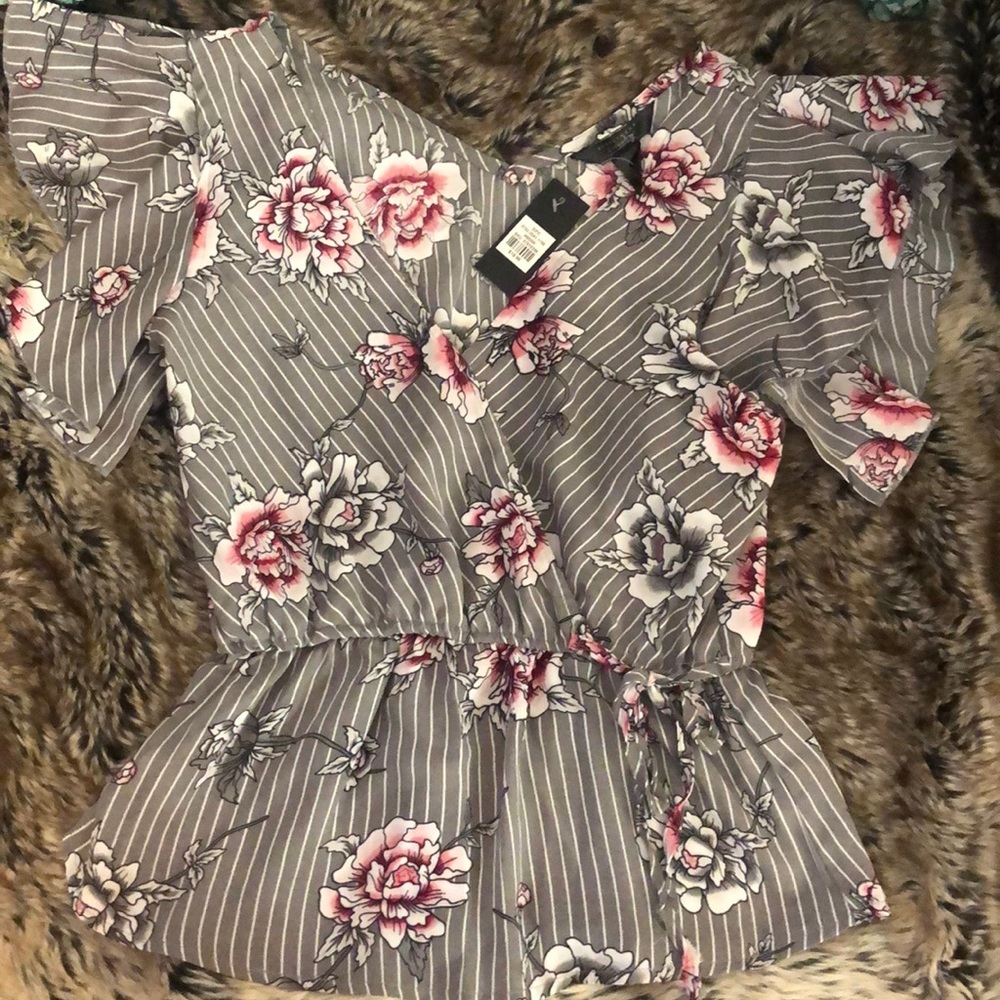 Blouse with stripes and floral design